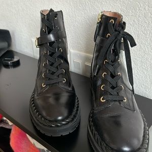 Black with gold Hardware lace up boot with zipper. Size 8.5